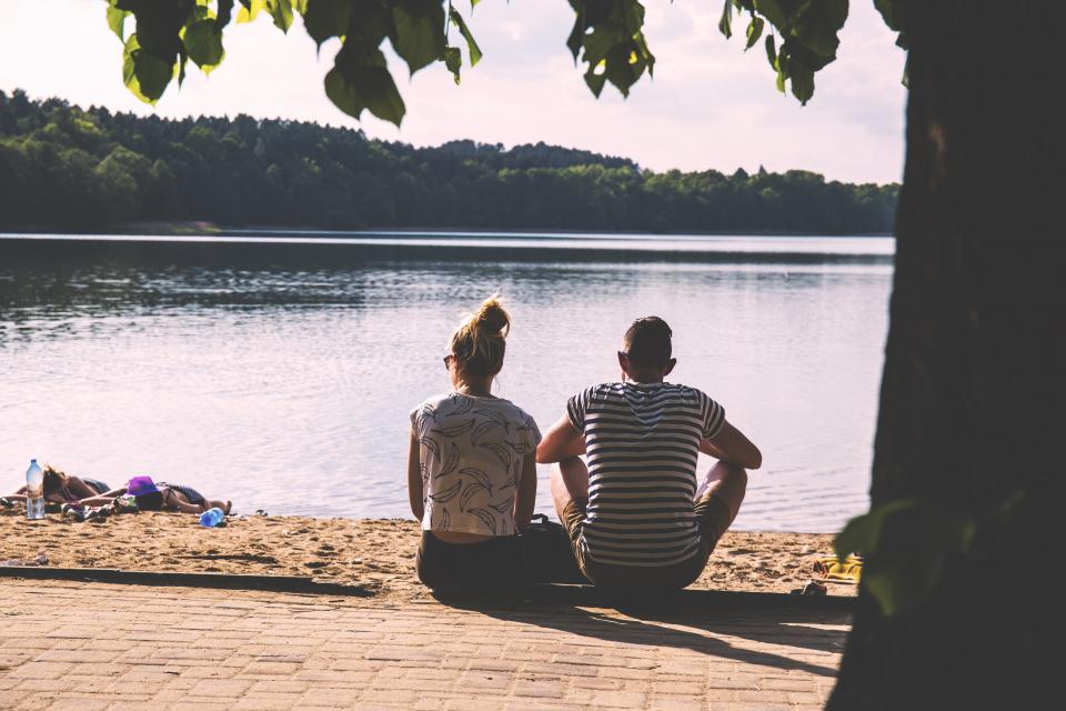 man, woman, people, couple, love, affection, date, picnic, sit, sand, bricks, floor, trees, water, lake, river, view